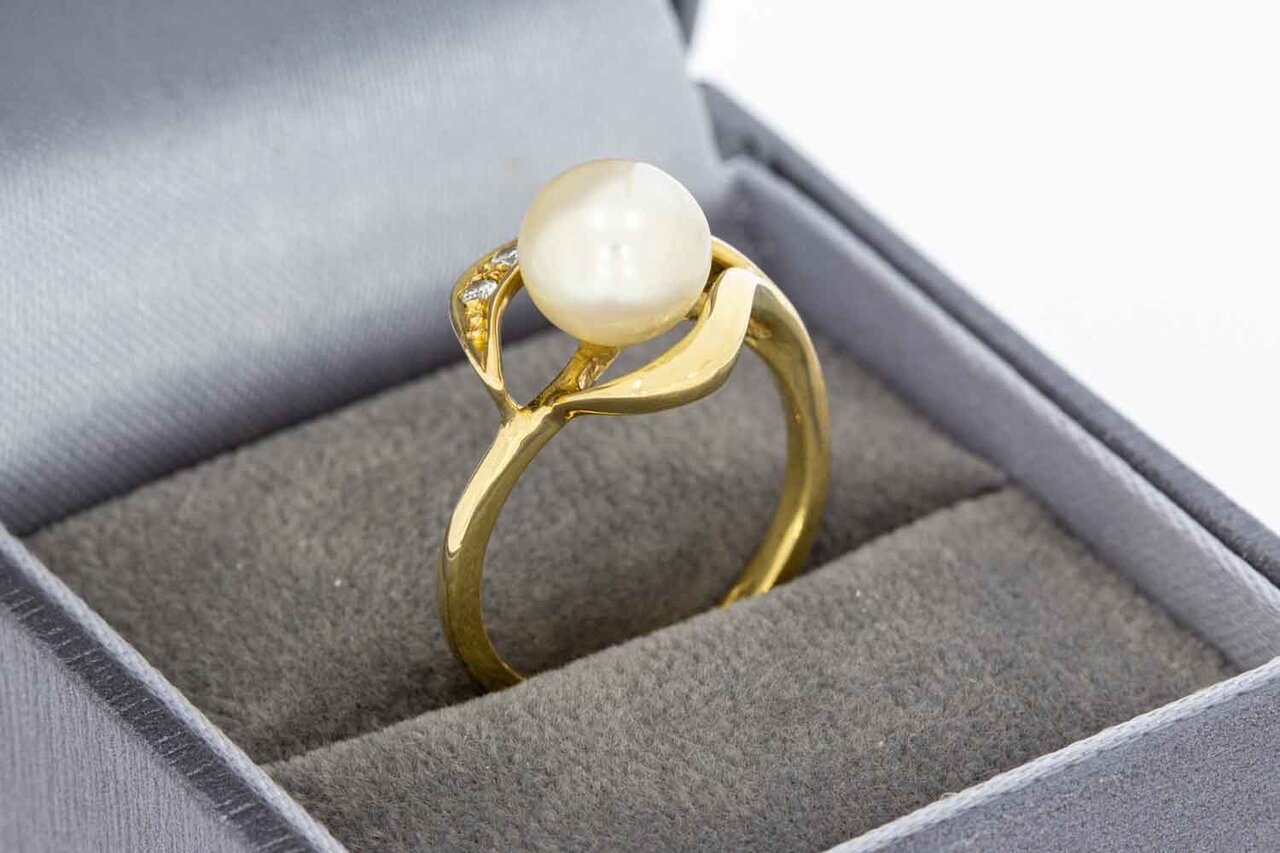 18 Karat Perlenring mit Diamant - 16,5
